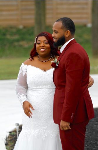 Red Wedding Suit with Bride